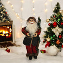 Statuina decorativa di Babbo Natale con bacchetta e costume dai colori festivi