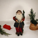 Statuina decorativa di Babbo Natale con bacchetta e costume dai colori festivi