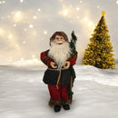 Statuina decorativa di Babbo Natale con bacchetta e costume dai colori festivi